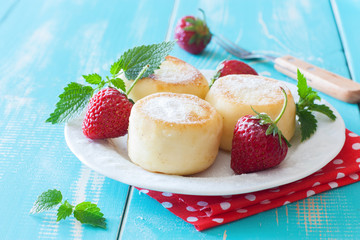 Cottage cheese donuts and fresh strawberries