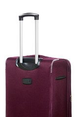 Travel suitcase with pull-out handle on a white background, side view