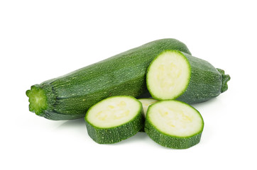 fresh green zucchini with slices isolated on white background