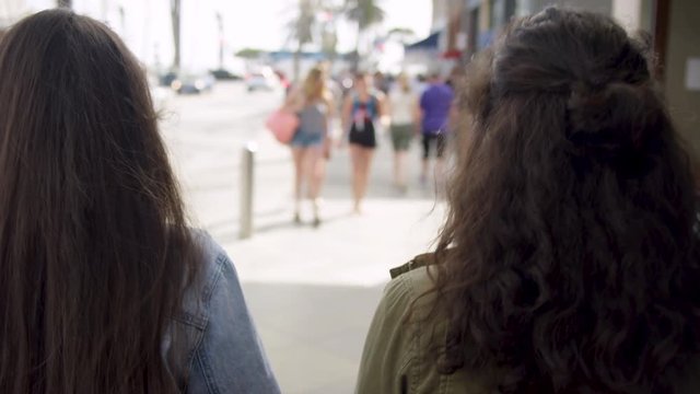 Friends Chat And Walk Down Busy Sidewalk On A Sunny Day In Santa Monica, CA - Shot On Red Scarlet-W Dragon In 4K, Slow Motion