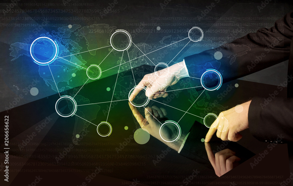 Poster Male hands touching interactive table with colorful world map on it 