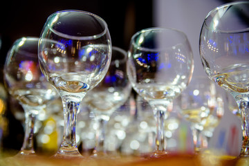     Glass glasses stand on a buffet table 