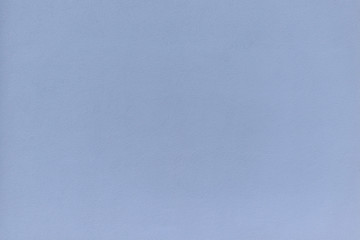 Textured painted blue wall surface background