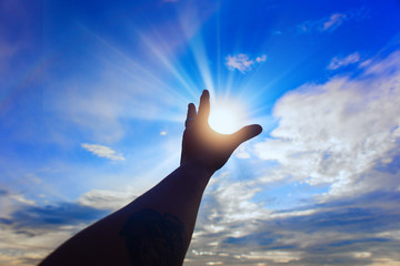 sunset,sunlight and blue sky with hand shadow.