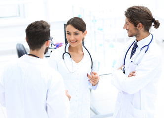 Fototapeta premium Team of different doctors having conversation