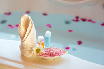 Soft and select focus Spa massage compress balls, herbal ball and treatments spa decoration, natural organic products on a bathtube.; Spa Thailand.