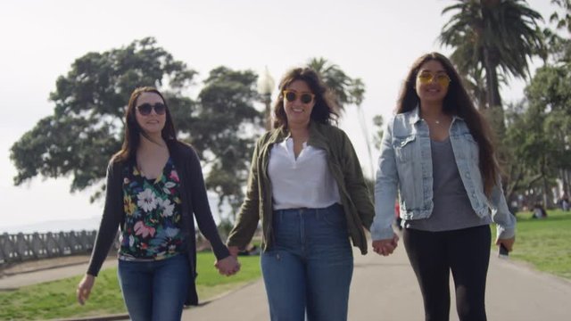 Group Of Best Friends Hold Hands And Explore Park Together In Santa Monica, CA - Shot On Red Scarlet-W Dragon In 4K, Slow Motion