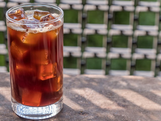 Iced coffee on wooden background