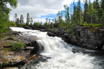 Obraz premium Waterfalls in Norway are very common and there is a choice for photographers for every taste