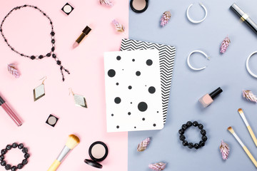 Fototapeta na wymiar Note book, woman beauty accessories flat lay on pastel background. Fashion or beauty blogger concept.
