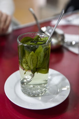 Coca tea on the table in Peru