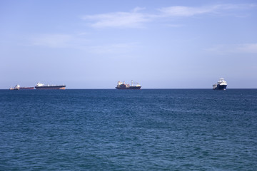 Cargo ships on the horizon