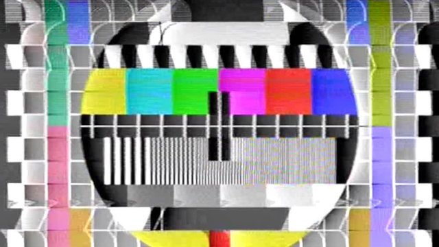 Analog capture (intentional heavy distortion fx): a tv test pattern (also called cinescope) made of blocks and shapes of varying dimensions.

