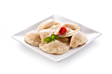 Dumplings - stuffed noodles on white background