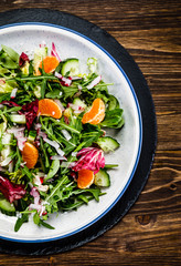 Vegetable salad on wooden background