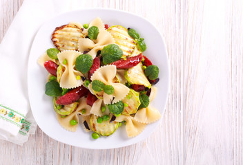 Farfalle, pea, zucchini and sausage salad