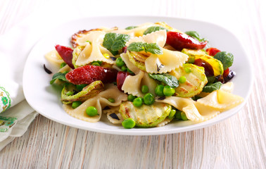 Farfalle, pea, zucchini and sausage salad