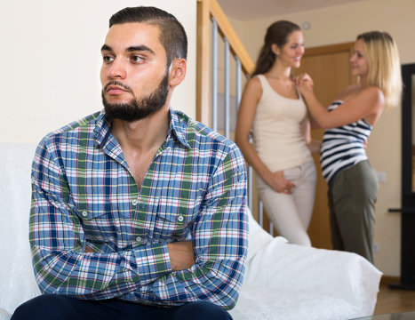 person keeping silence turned away from friends