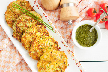 Zucchini patties with herbs and pesto © filirochka