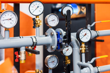The pipeline system is equipped with pressure gauges and ball valves.