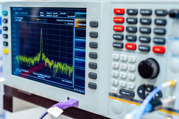 Fragment of a modern digital oscilloscope. Scientific measuring equipment.
