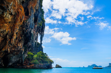 Amazing view of beautiful beach with speedboat. Location: Railay beach, Krabi, Thailand, Andaman...