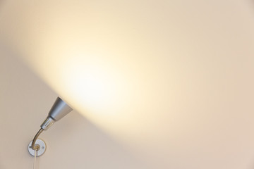 Spotlight shining on cement wall background, Empty space wall backgrounf with shining light