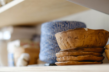 pottery business. handicraft handmade production. assortment of craft crockery and clay plates