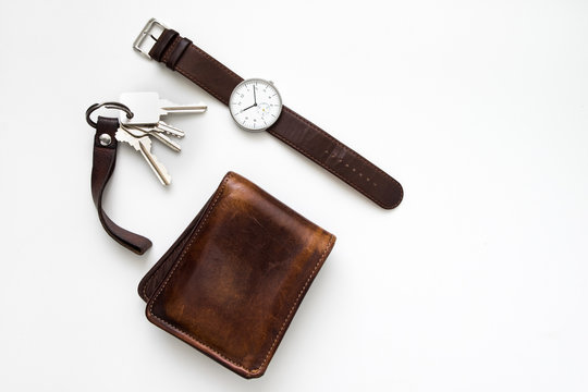 Top View Of Everyday Carry Objects Made By Brown Leather On White Background