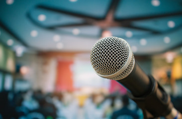 Seminar Conference Concept : Microphones for speech or speaking  in seminar room, talking for lecture to audience university, Event light convention hall Background.