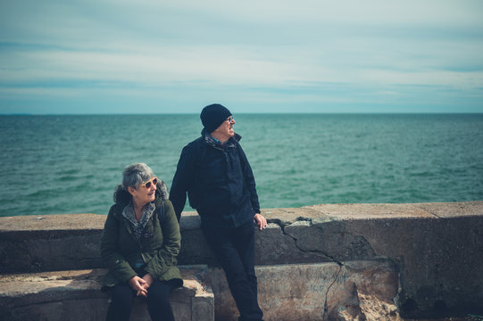 Senior couple relaxing by the sea
