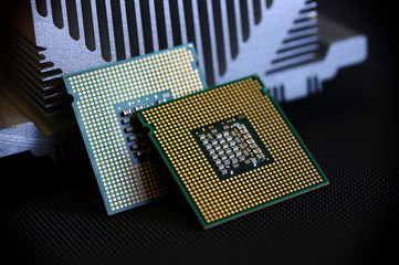closeup of CPU chips on aluminum heat sink cooler