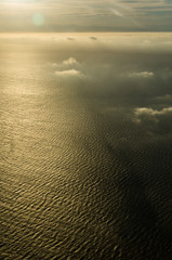 Flying above the clouds, view from the airplane