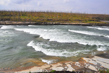 Turbulent rapids on the river.