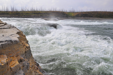 Turbulent rapids on the river.