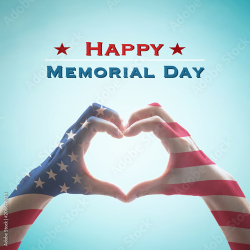 Happy memorial day with America flag pattern on people hands in heart shape isolated on mint sky background