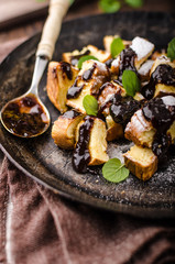 Cutted pancakes, Kaiserschmarrn delish dessert with plums