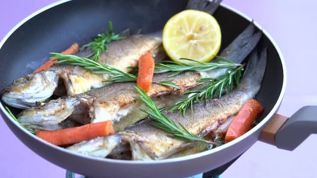 Frying Dorade Fish On A Pan 