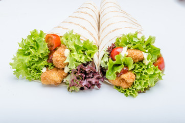 Grilled tortilla with chicken, mayo and tomato ketchu....Grilled tortilla chicken, lettuce, homemade mayo and barbeque sauce