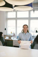 Portrait Of Female Clothing Designer At Workplace