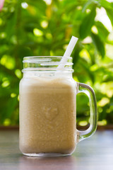 Coffee shake for breakfast. Cold, refreshing drink dessert in nature