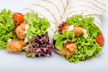 Grilled tortilla with chicken, mayo and tomato ketchu....Grilled tortilla chicken, lettuce, homemade mayo and barbeque sauce