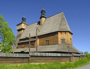 Church of the Blessed Virgin Mary and Archangel Michael in Haczow - largest wooden Gothic church in Europe and the oldest wooden church in Poland. UNESCO World Heritage - obrazy, fototapety, plakaty