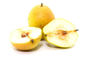Naklejka na ściany i meble Two yellow Fresh ripe organic pears and half pear
