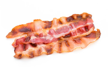 Cooked bacon rashers isolated on white.