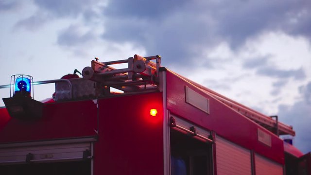 Fire truck with flashing lights on