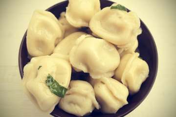 Appetizing traditional Russian dumplings with meat close-up