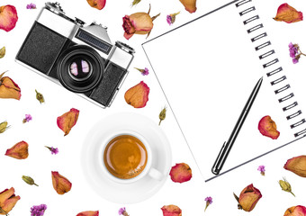 Vintage retro photo camera, notepad, pen, coffee cup and dried flowers isolated on white background. Flat lay, top view