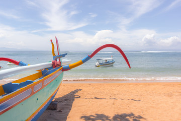 Fototapeta na wymiar Colorful fishing- boats on a balinese beach