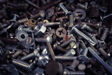 Grunge rusty metal screws and details. Old screws.